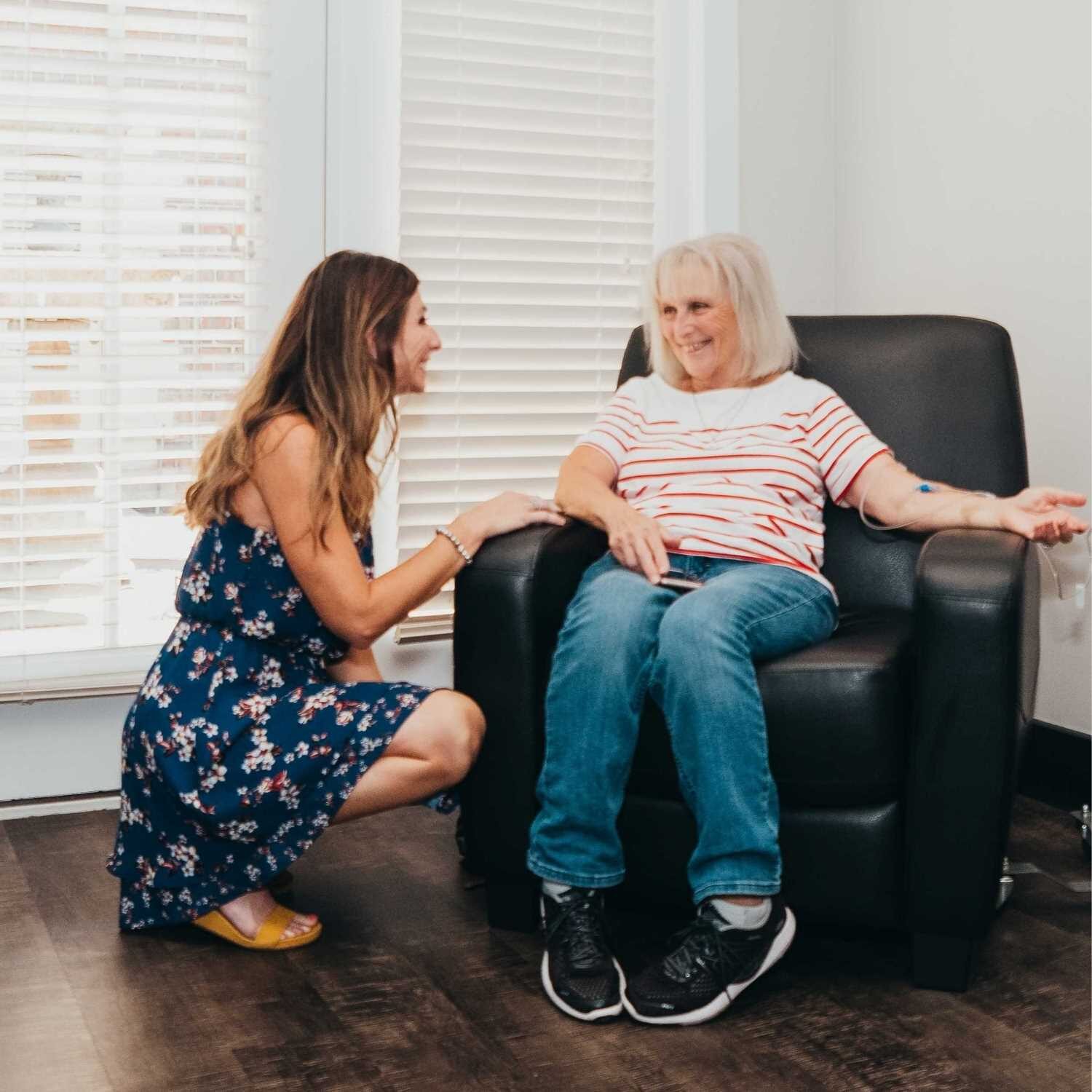 Integrative Medicine in Springfield Missouri Keri Talking To Patient in Recliner Alternative Cancer Treatment