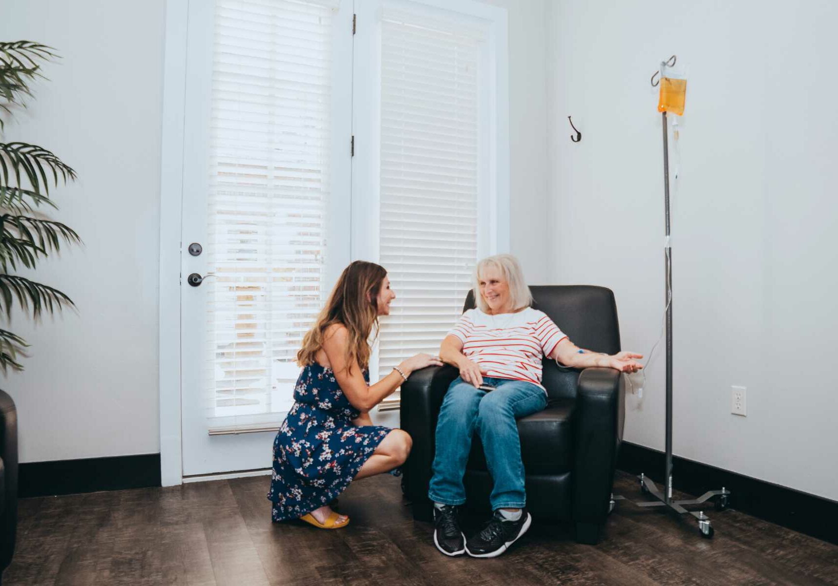 Nurse practitioner helping at patient at Kare Health and Wellness in Springfield, MO.